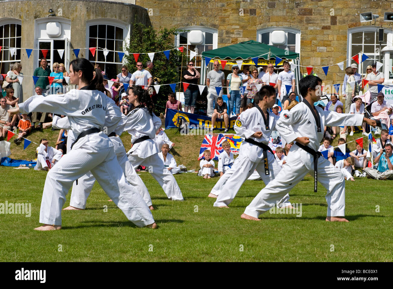 Participants show their skills during a taekwondo demonstration Stock