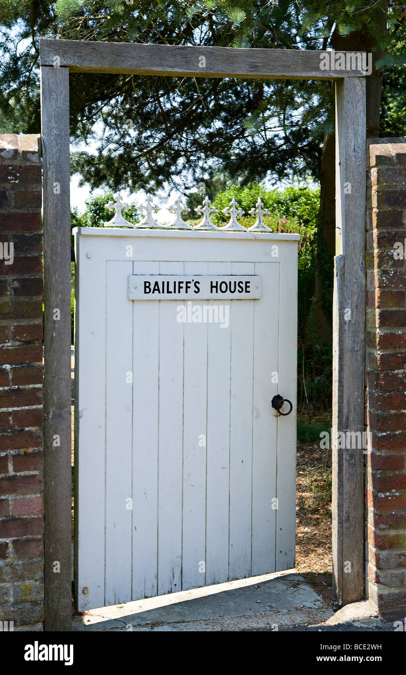 Bailiffs House sign on gate, Slindon Village, West Sussex, UK Stock Photo