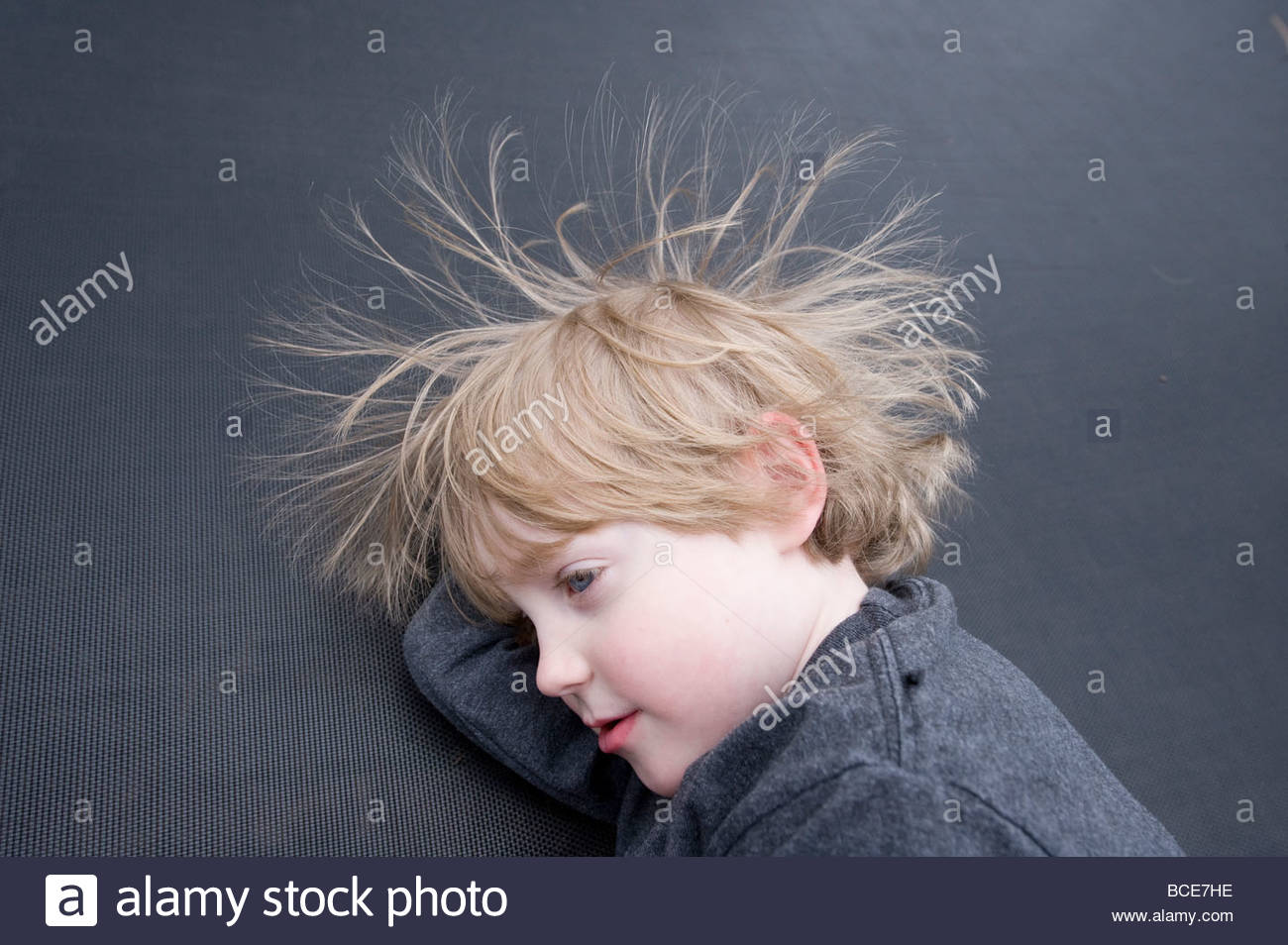Static Electricity Makes A Young Boy S Hair Messy Stock Photo