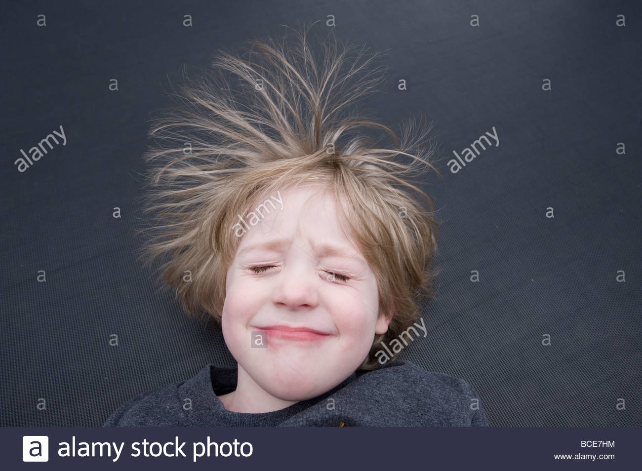 Static Electricity Makes A Young Boy S Hair Messy Stock Photo