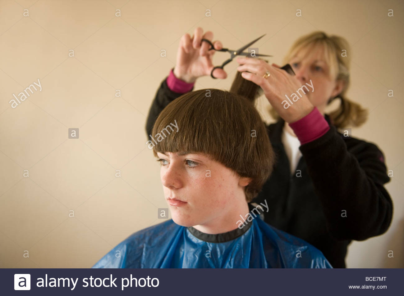 A 14 Year Old Boy Gets A Haircut Stock Photo 24899640 Alamy