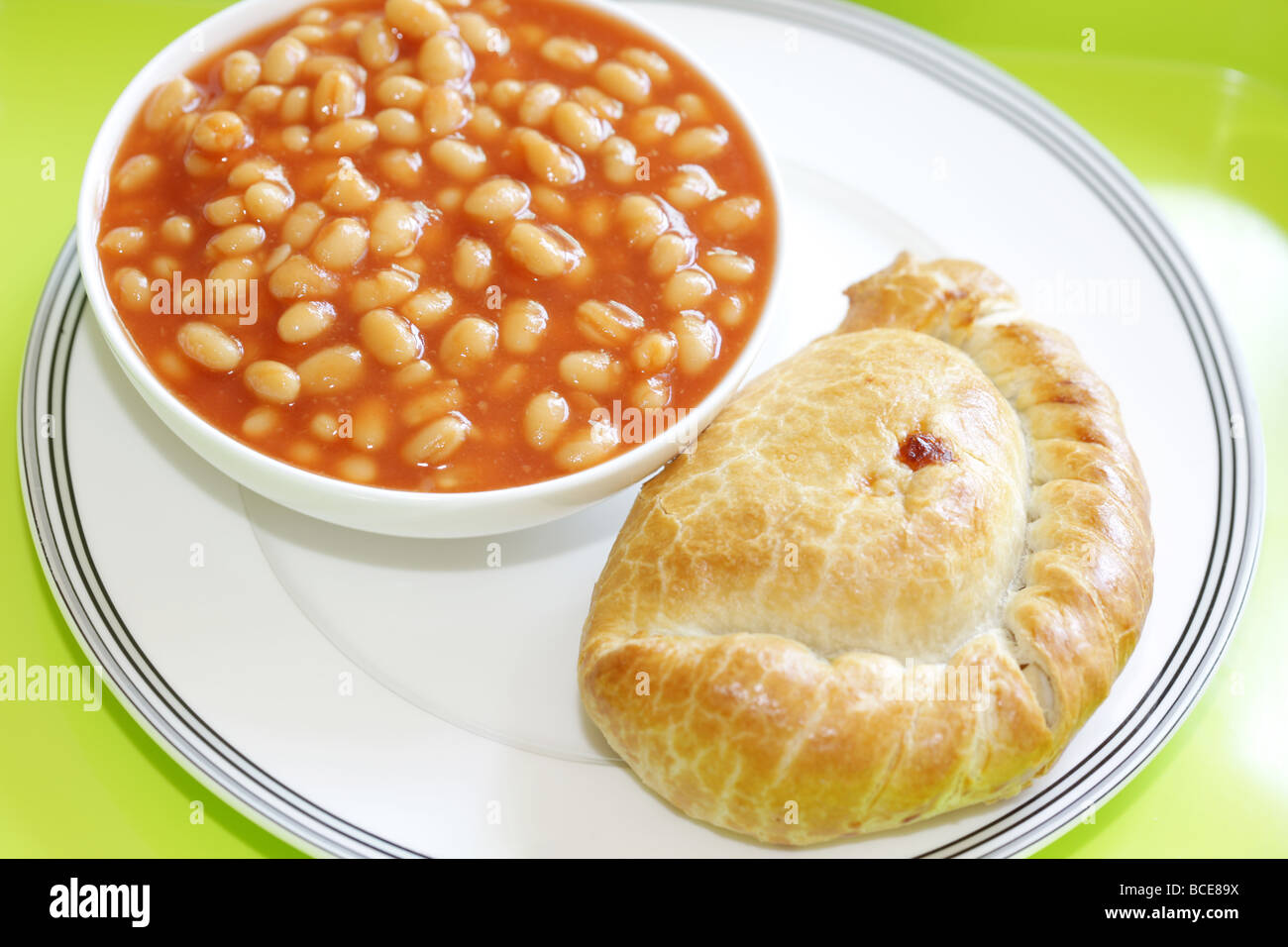 cheese-and-onion-pasty-with-baked-beans-stock-photo-alamy