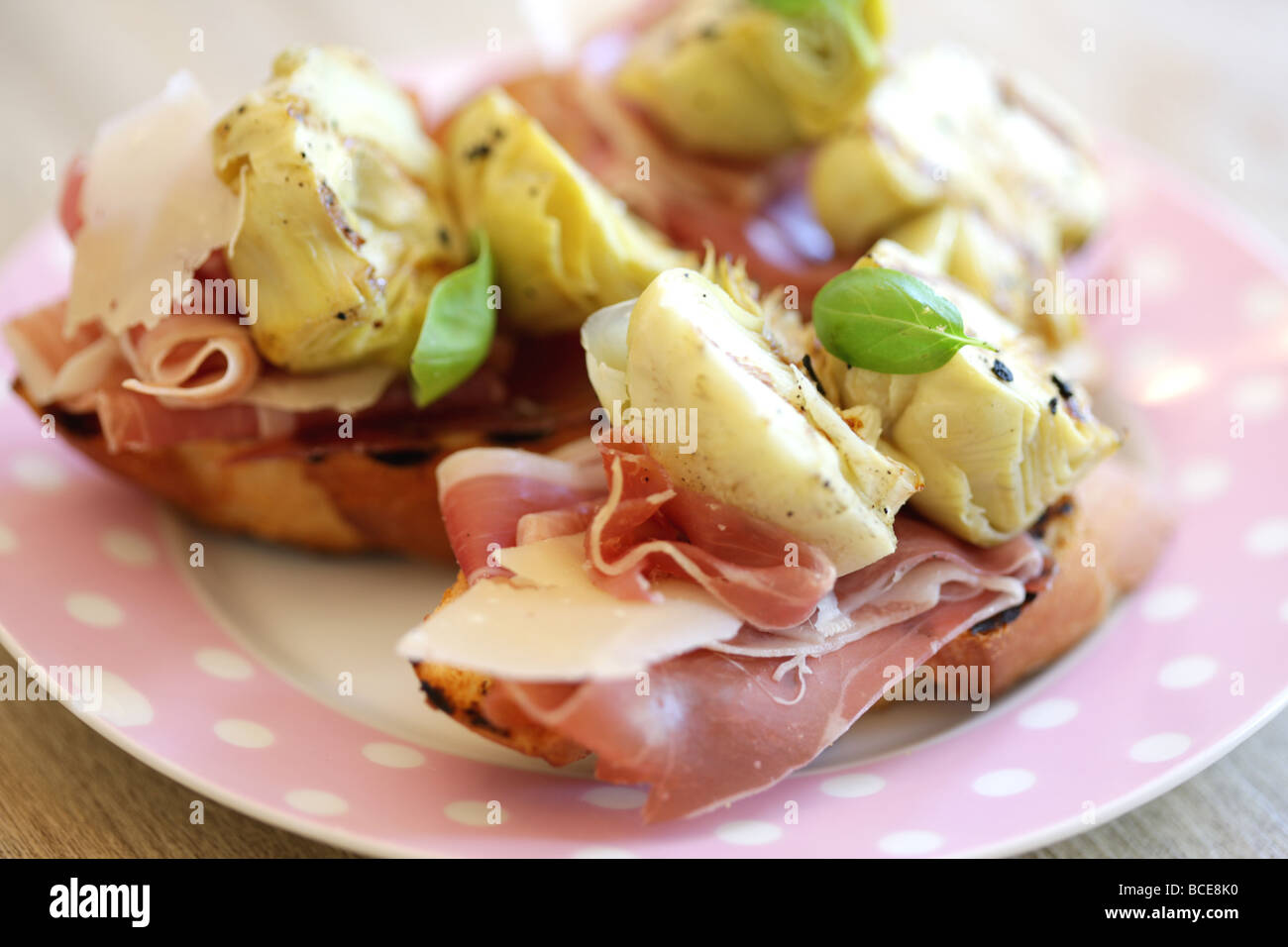Parma Ham and Artichokes on Bread Stock Photo Alamy