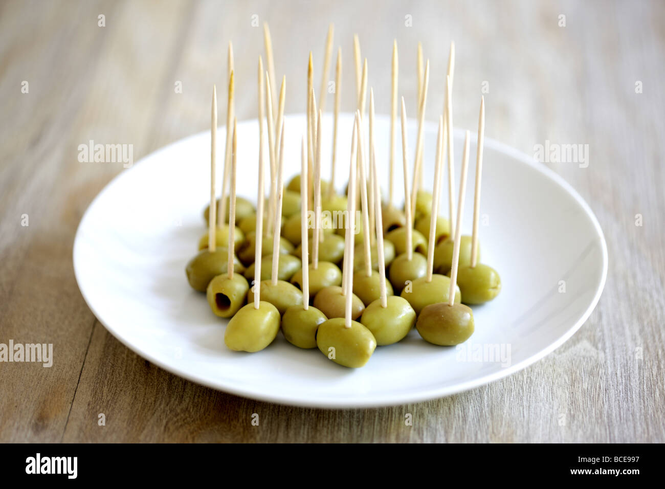 Green Olives on Cocktail Sticks Stock Photo Alamy