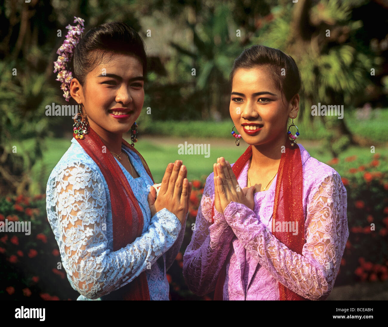 2308 Girls making Wai Thai greeting at the Rose Garden Central Thailand ...