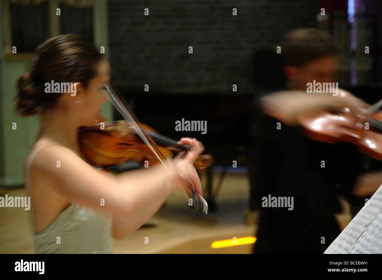 Carolina Kurkowski Perez and Alexander Kiss playing violin Stock Photo