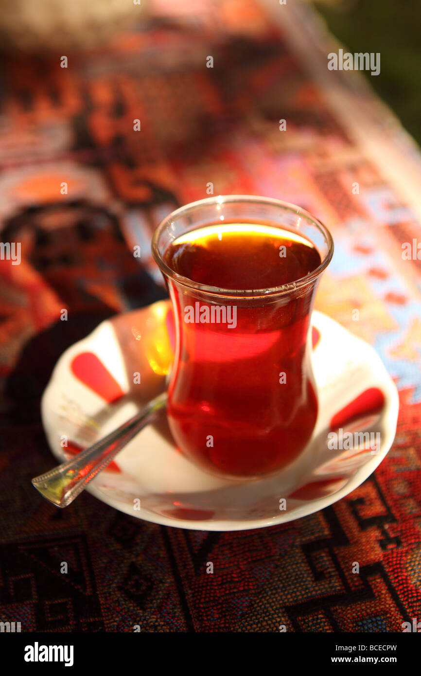 Turkey cup glass of hot sweet tea local Turkish name Cay in Istanbul cafe Stock Photo