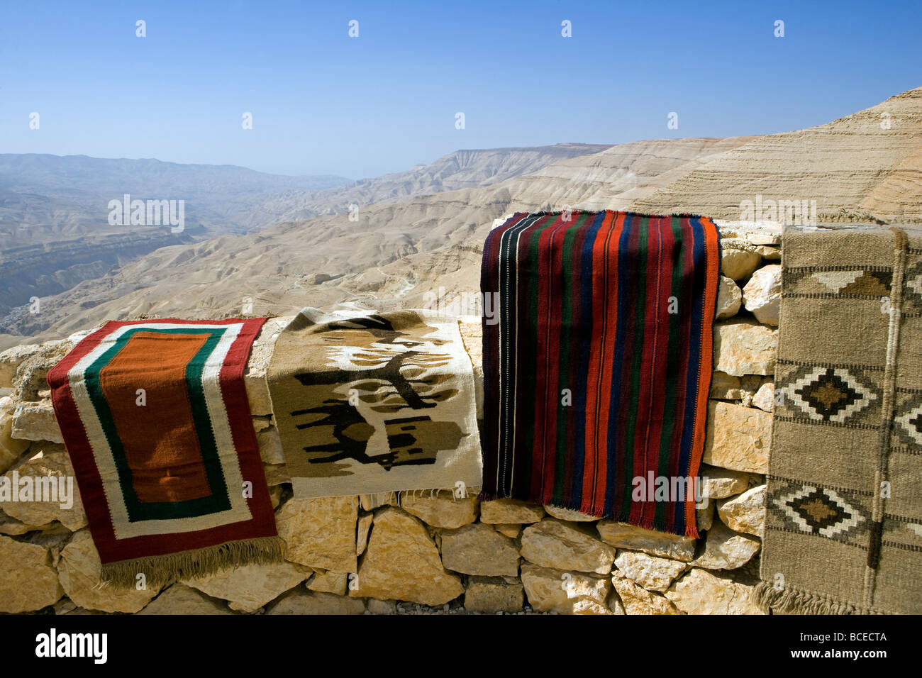 Jordan, Petra Region. A carpet stall over looks deep canyons lining the