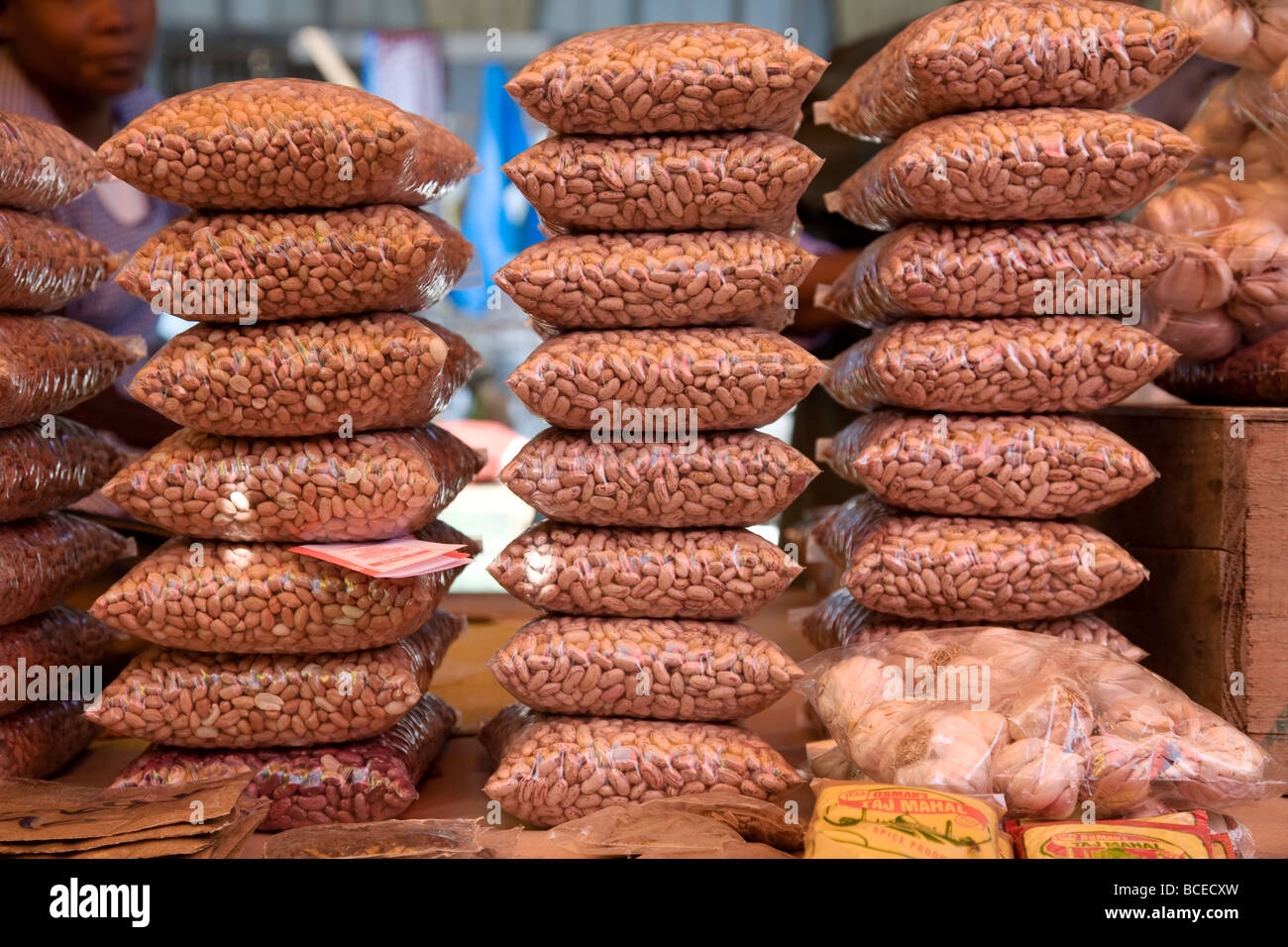 Mozambique, Maputo. Bagged white beans in abundance on a stall in the Central market in the Baixa district of Maputo. Stock Photo