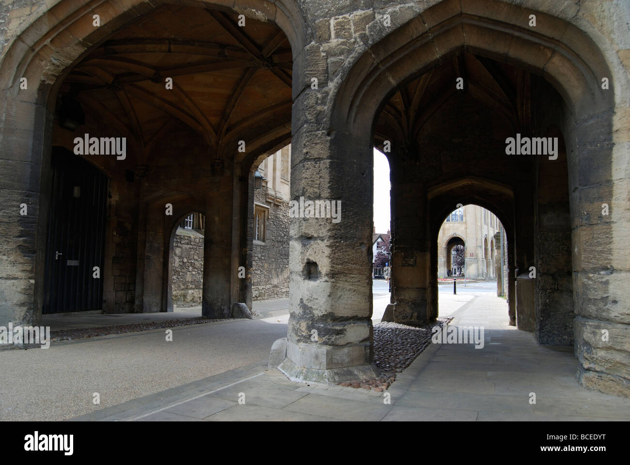 The stone archways beside St Nicholas Church at the Marketplace in Abingdon in Oxfordshire Stock Photo