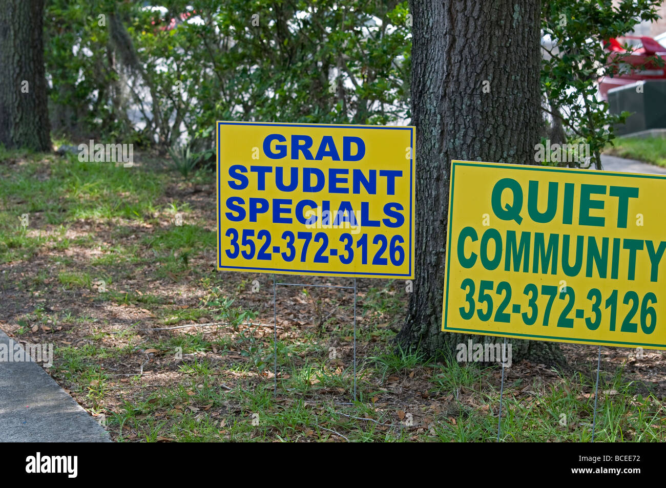 Sign for graduate student apartment rentals in front of housing complex