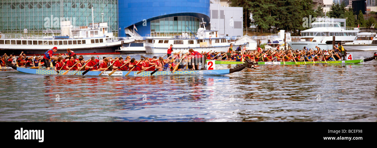 Dragon Boat Race in False Creek, Vancouver, British Columbia, Canada - Boats racing at Alcan Dragon Boat Festival Stock Photo
