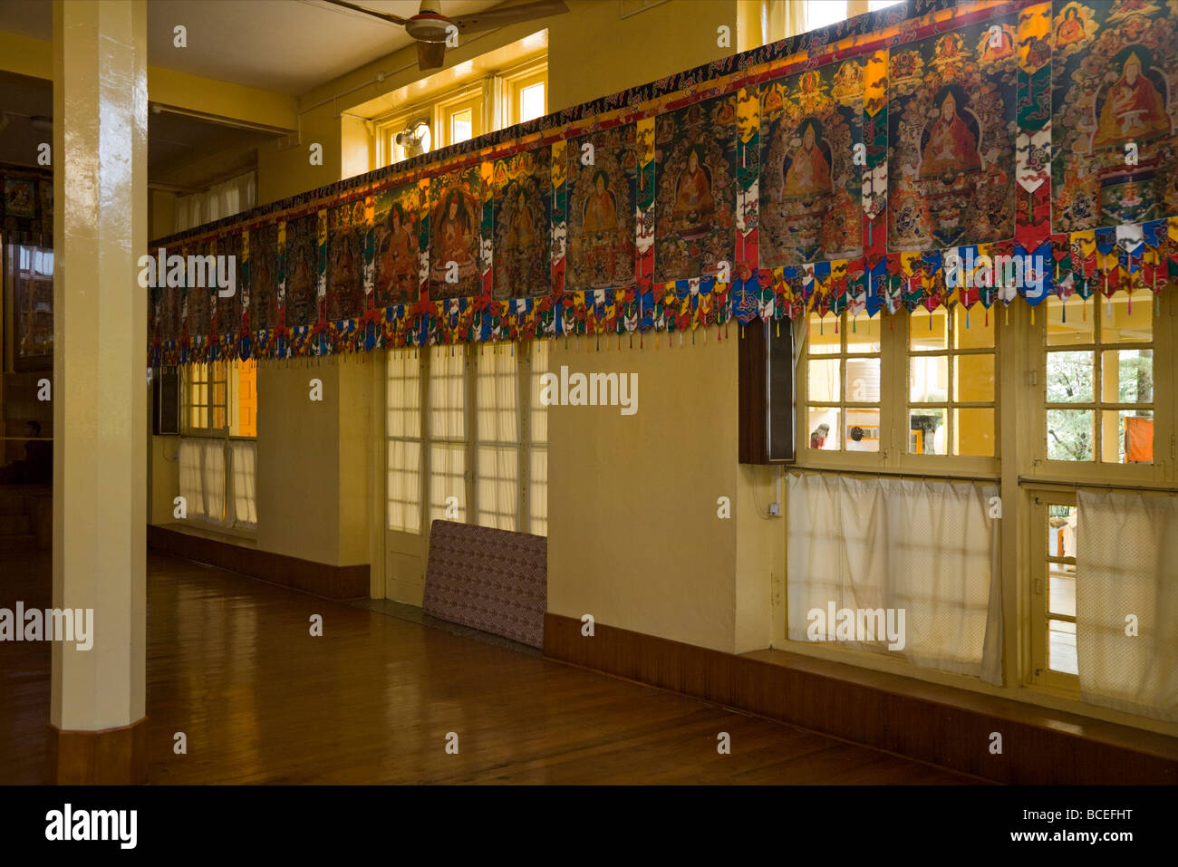 Side wall – with hanging decoration – of hall in the Tsuglagkhang Complex temple, McCleod Ganj. Himachal Pradesh. India. Stock Photo