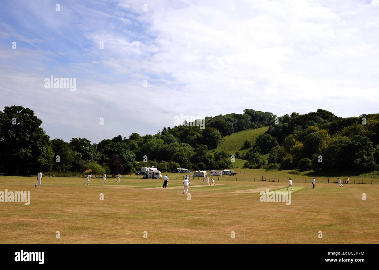 Action in the Sussex League cricket match between Findon and Slinfold at the Long Furlong ground at the foot of the South Downs Stock Photo