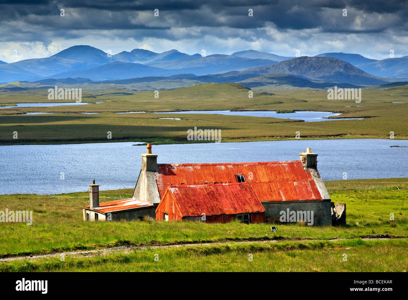 A red roofed cottage Acha Mor Isle of Lewis, Outer Hebrides, Western Isles, Scotland UK 2009 Stock Photo