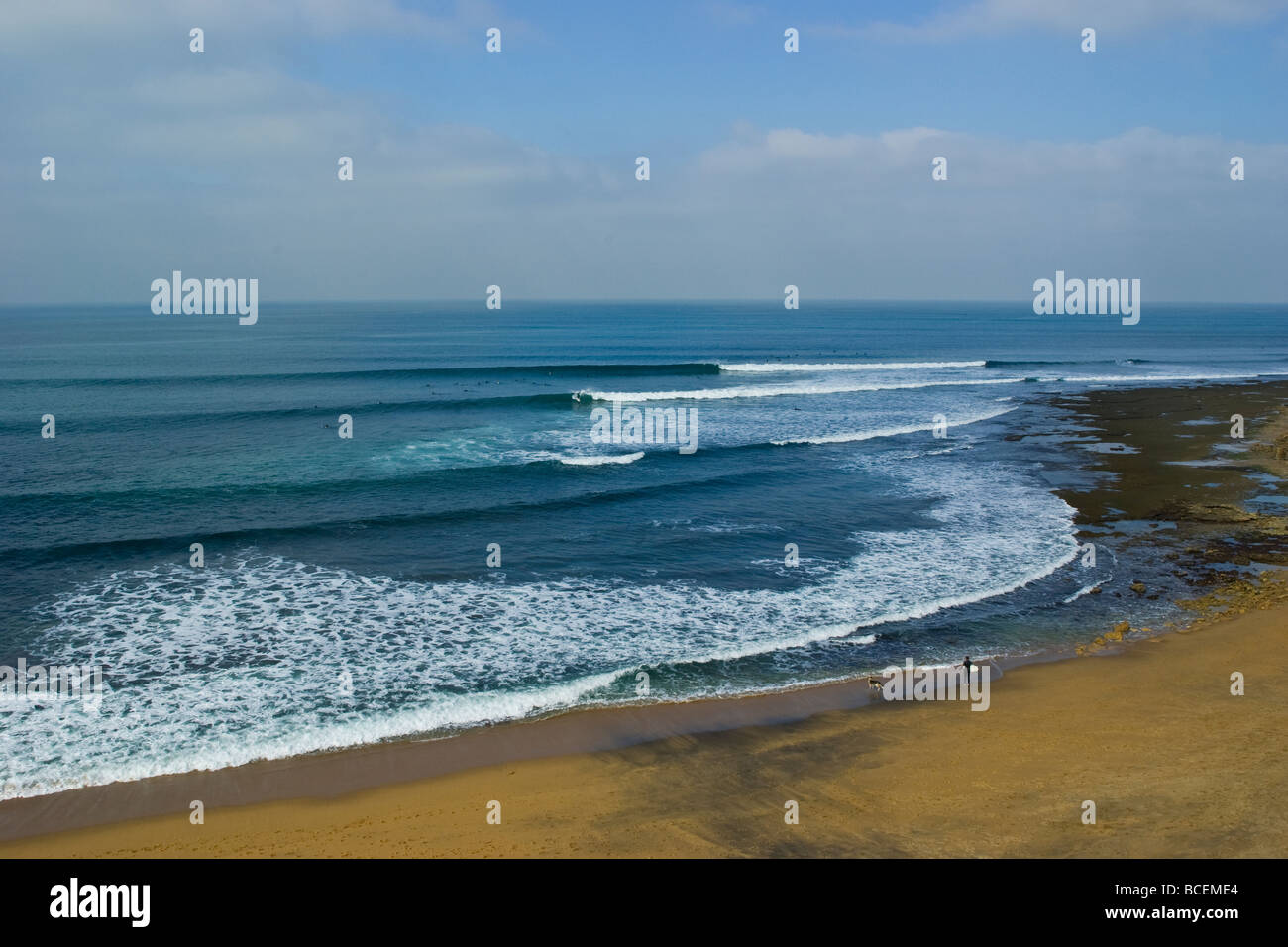 Lines of swell peel around the point at the surfing mecca Bells Beach. Stock Photo