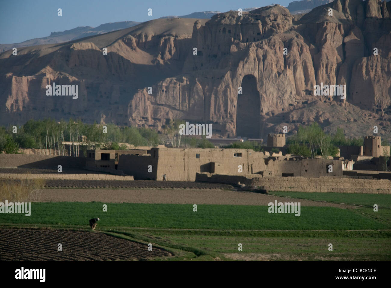 The empty niche in Bamiyan cliffs which, until 2001, held the Big Buddha, 55-m high, still dominates the peaceful valley below Stock Photo