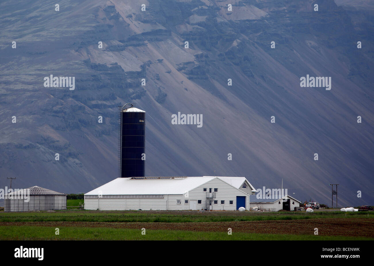 Farm and silo, near Höfn, southeast Iceland. Stock Photo
