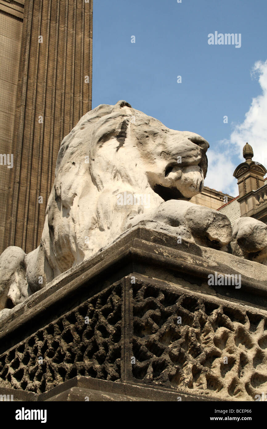 Leeds City Hall these two Lion Sculptures are seen flanking the Town Hall. Lions where a common favorite of the Victorian era Stock Photo
