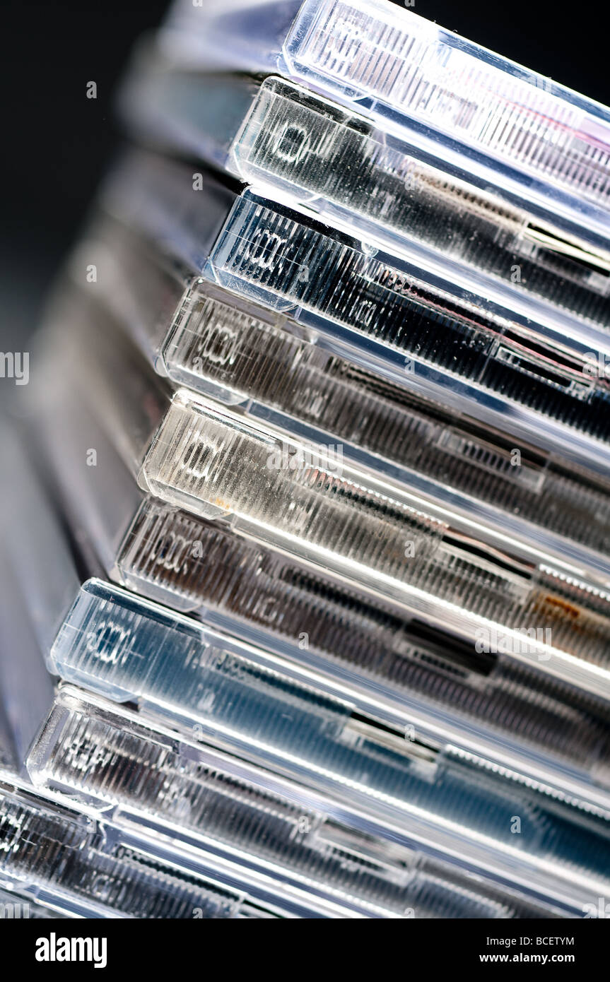 A tilted closeup of CDs in cases Stock Photo