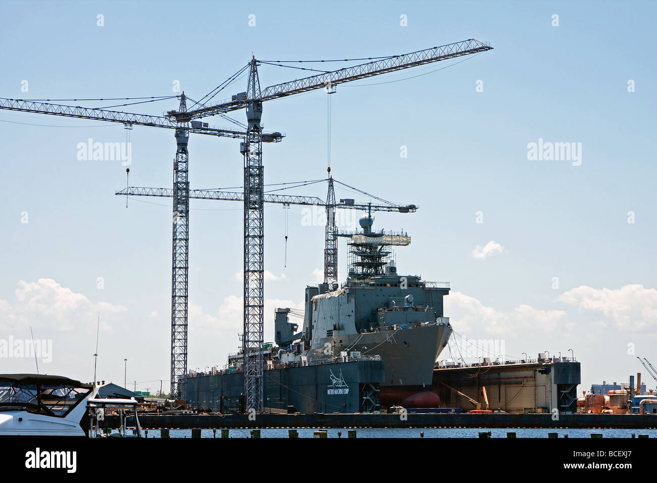 The USS Whidbey Island LSD 41 Navy marine battleship in a dry dock in Norfolk Virginia getting repaired for maintenance Stock Photo