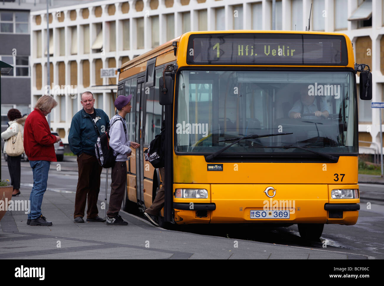 People boarding a city bus, Reykjavík, Iceland Stock Photo
