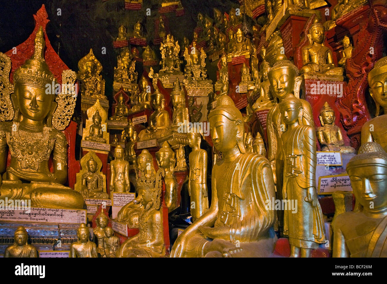 Myanmar. Burma. Pindaya. Some of the 8,000 golden statues of Buddha are housed in the extensive limestone caves at Pindaya. Stock Photo