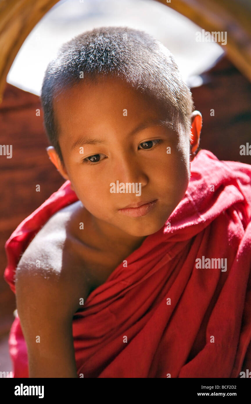 Myanmar. Burma. Nyaung-shwe. A young novice monk in the mid-19th century Shwe Yaunghwe monastery. Stock Photo