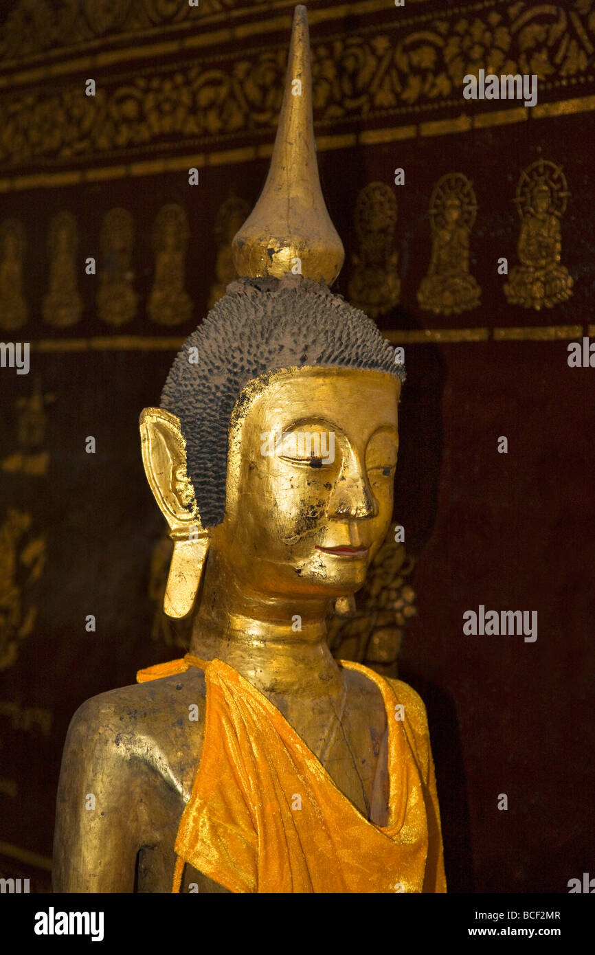 Myanmar, Burma, Kengtung. A ancient wooden statue of Buddha in the Wat In monastery at Kengtung. Stock Photo