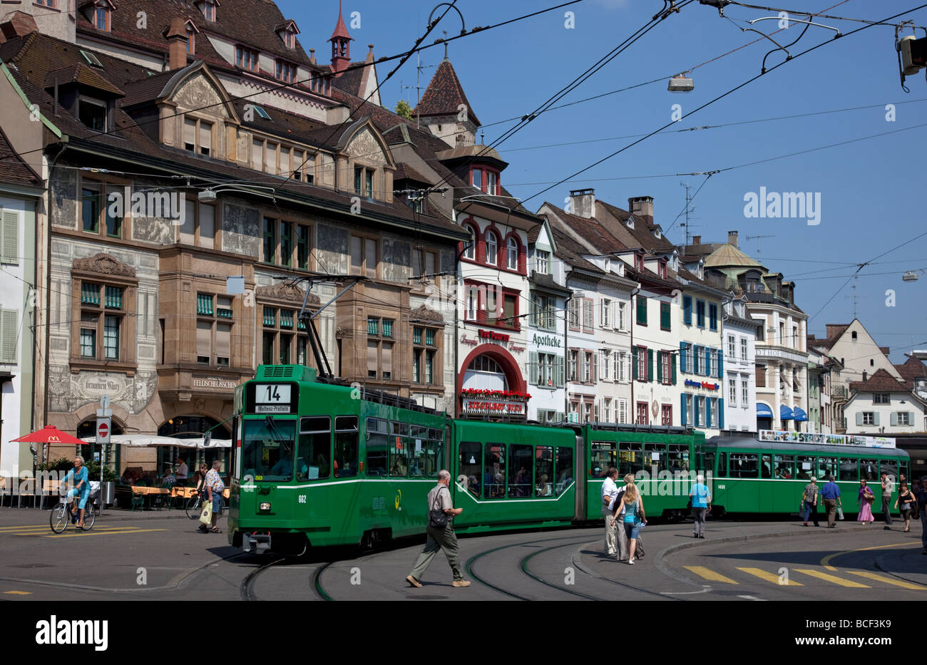 Trams in Barfusserplatz with Kohelenberg in background , Basel, Switzerland, Europe Stock Photo