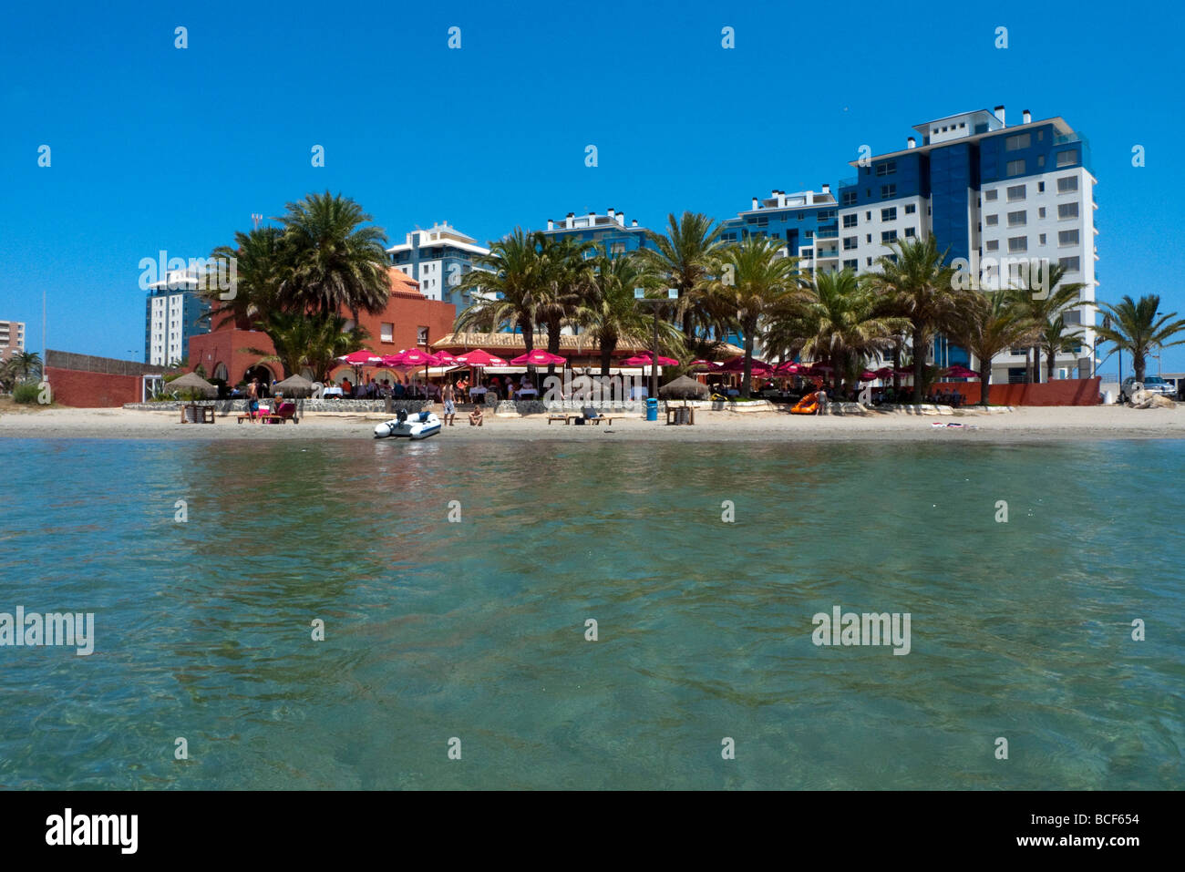 Holiday Apartments, Restaurants, Bar and beach by the Mar Menor (Inland Sea) in the region of Murcia, Spain Stock Photo