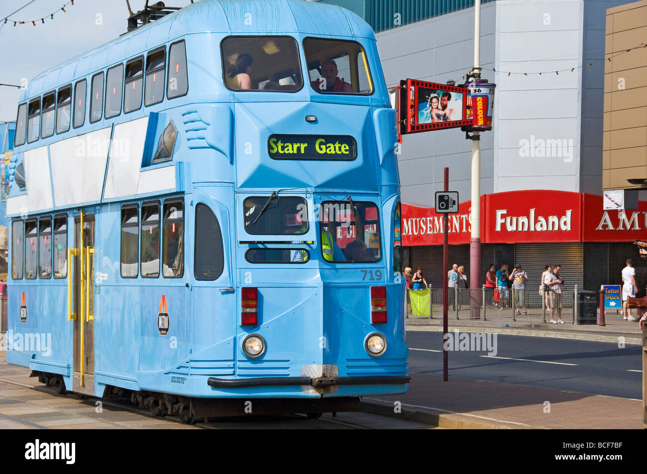 Electric tram travelling along Golden Mile Blackpool Lancashire England UK United Kingdom GB Great Britain Stock Photo