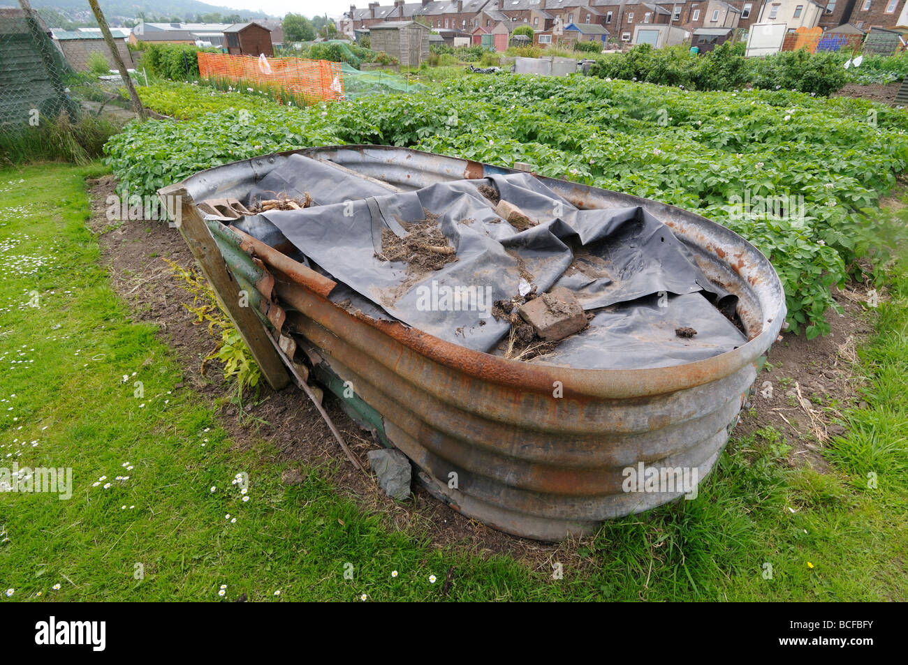 Anderson shelter recycled as a compost bin Stock Photo
