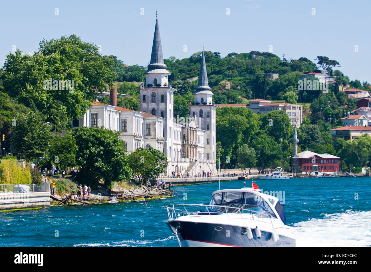 Turkey , Istanbul , Bosphorous or Bogazi , Kuzguncuk , the Turkish Military College & motor boat in foreground Stock Photo