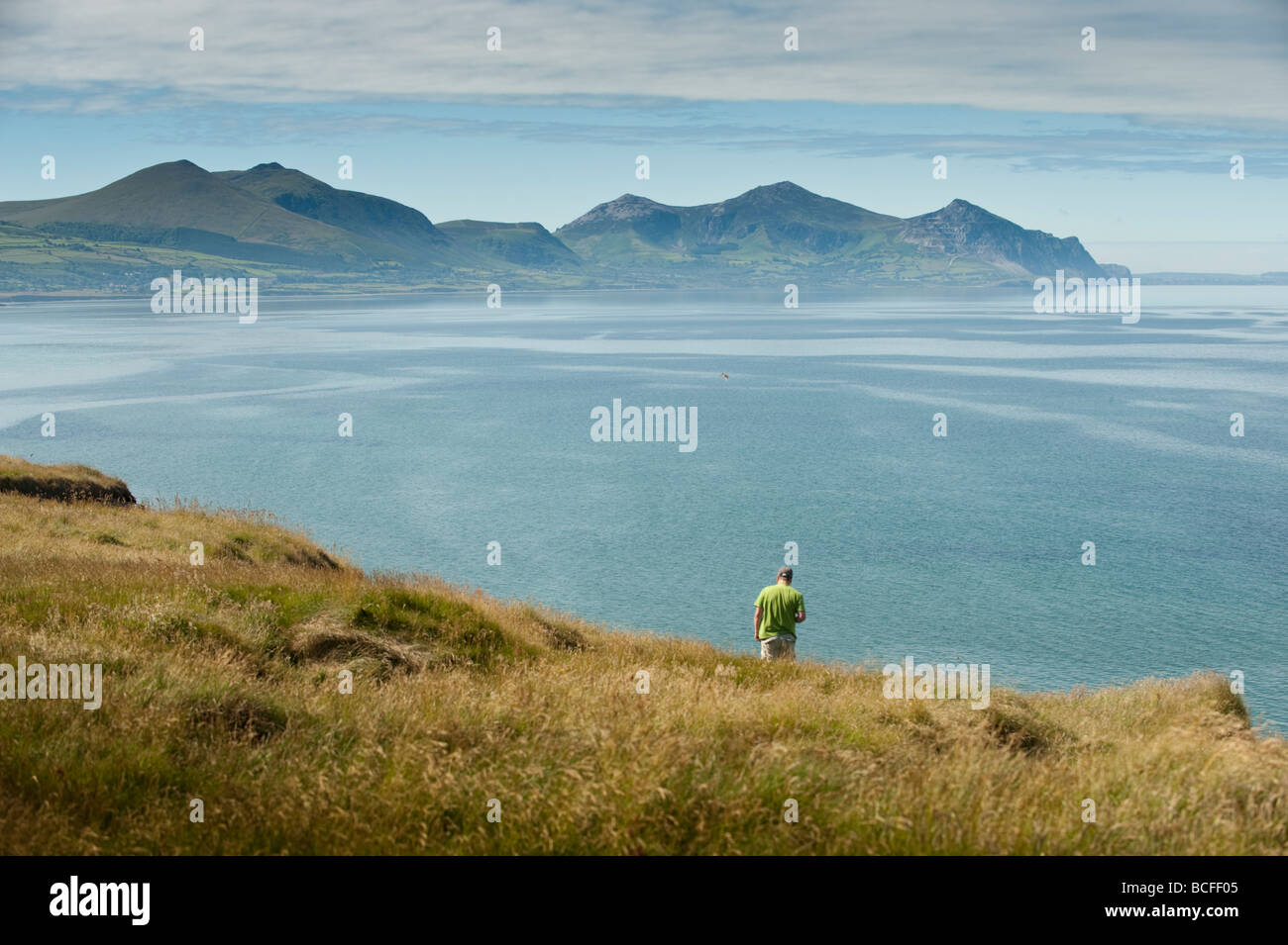 Looking towards Yr Eifl The Rivals mountains Summer morning Dinas Dinlle  on the north coast of the Lleyn Peninsula Wales UK Stock Photo