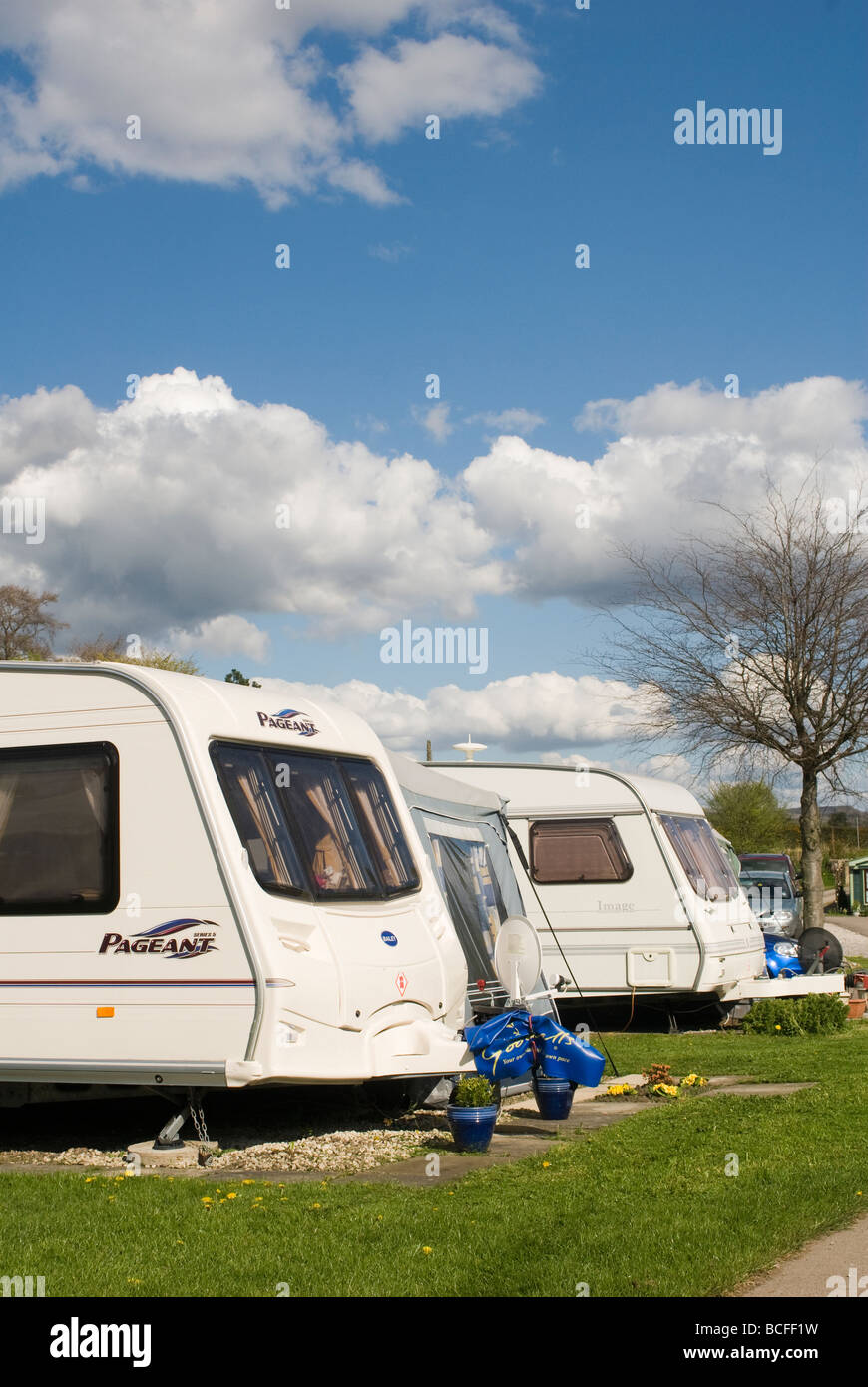 Rows of touring caravans on a campsite in Derbyshire on a sunny summers day Stock Photo