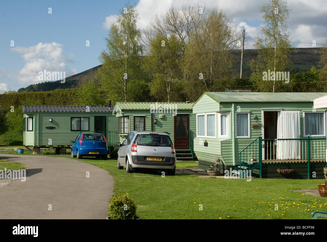 Row of static caravans on a campsite in Derbyshire on a sunny summers day Stock Photo