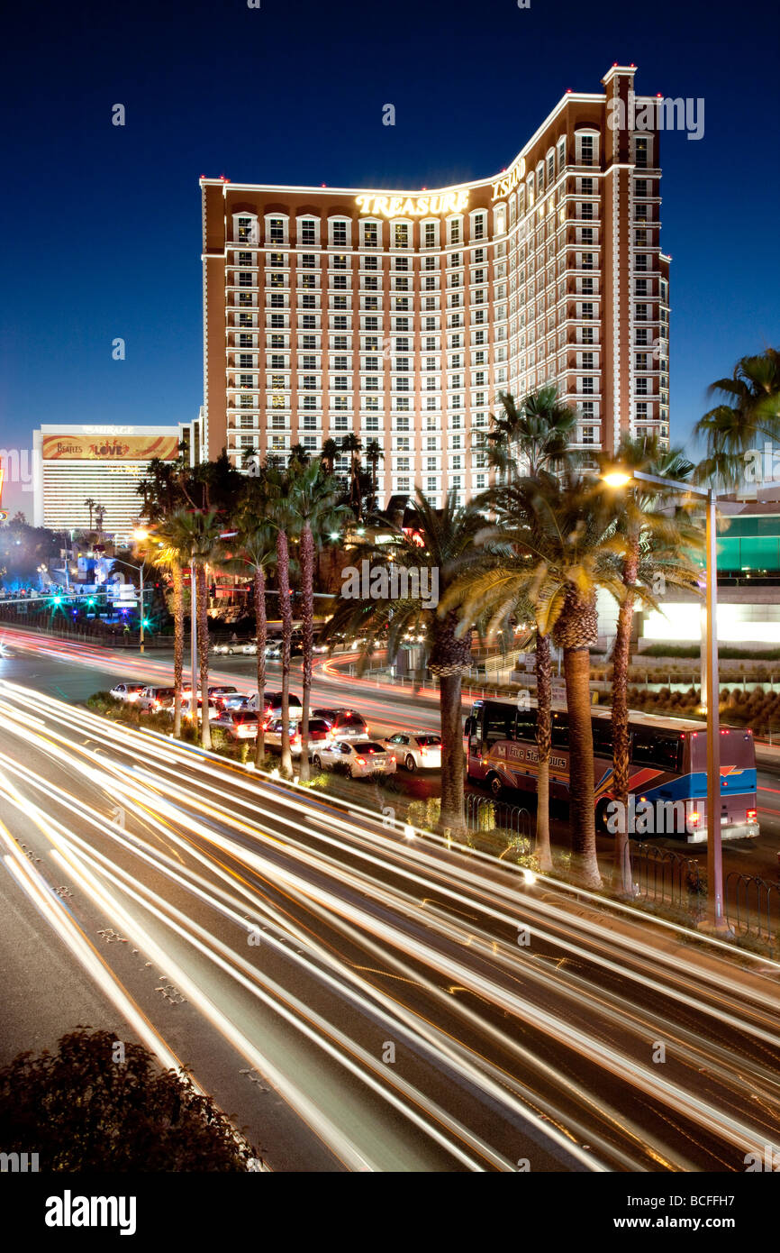 USA, Nevada, Las Vegas, The Strip, Las Vegas Boulevard and Treasure Island Hotel and Casino, dusk Stock Photo