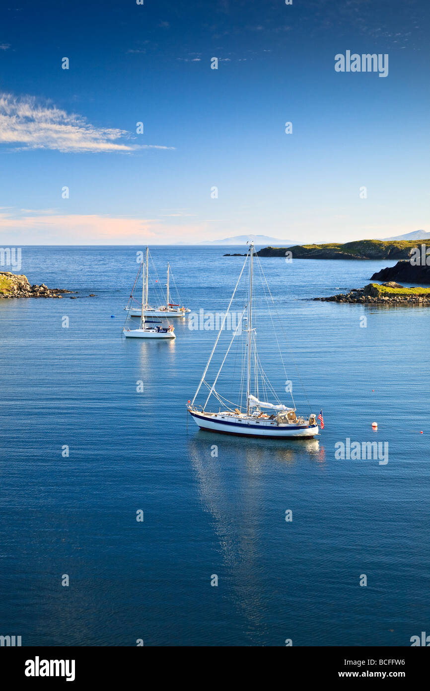 Sailing yachts anchored in Loch Rodel a small quiet bay at Rodel, Isle of Harris, Outer Hebrides, western isles, Scotland, UK Stock Photo