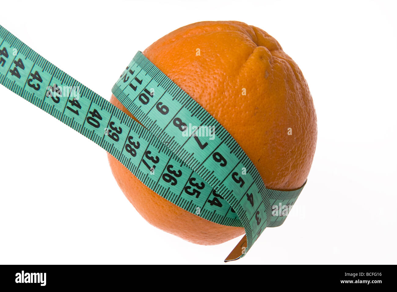 orange with a measuring tape Stock Photo