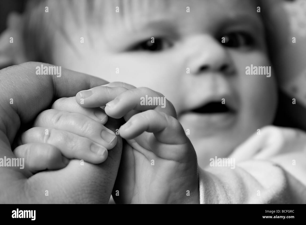 Hands grabbing child Black and White Stock Photos & Images - Alamy