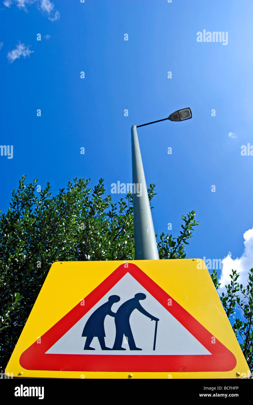 british road sign warning drivers that elderly people may be crossing the road Stock Photo