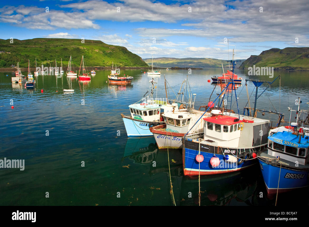 Fishing boats moored in the harbour at Portree, Isle of Skye, Scotland, UK 2009 Stock Photo