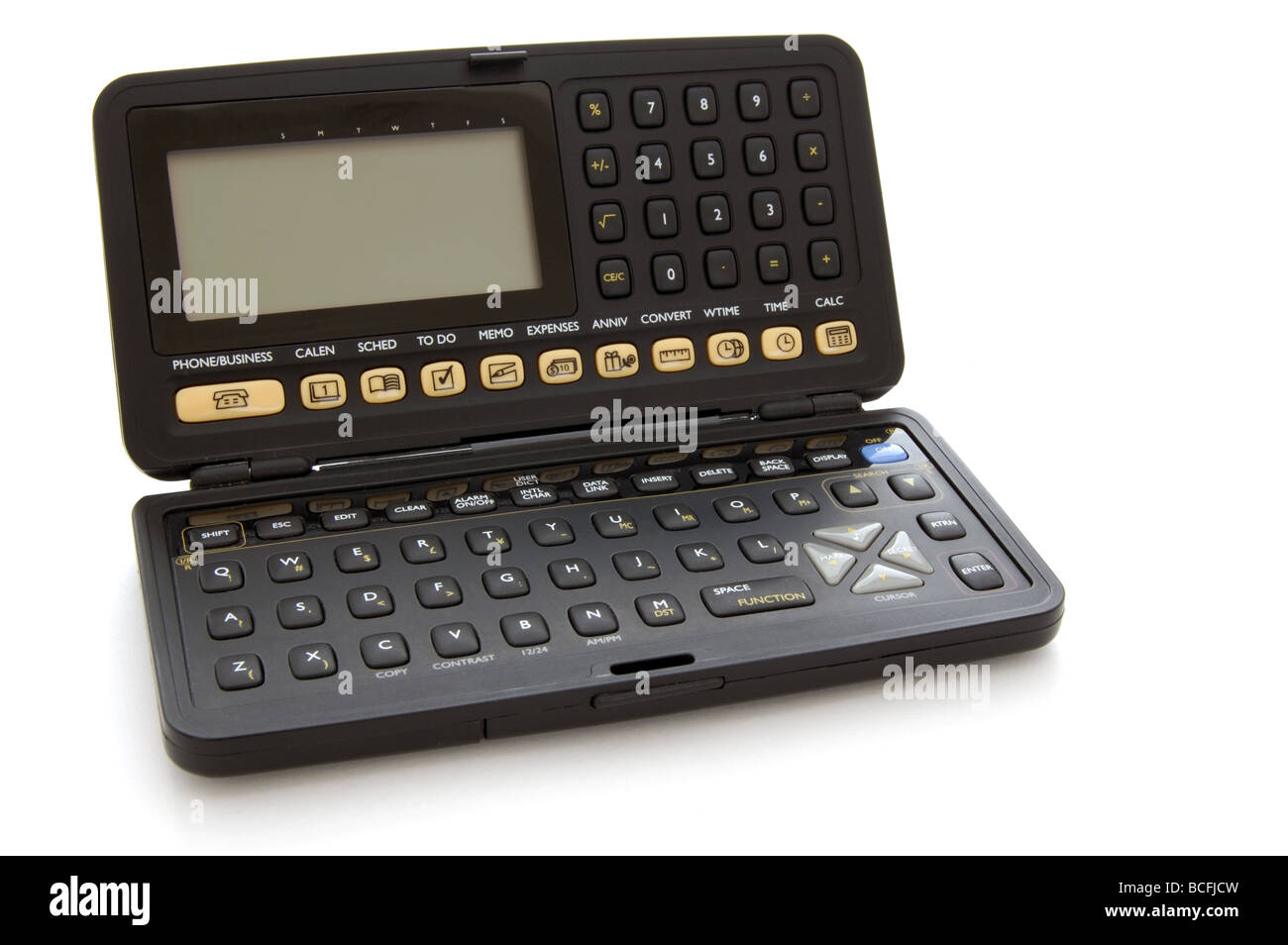 The keyboard of an old electronic organizer with liquid crystal display  isolated on a white background. Obsolete technology of the 90s Stock Photo  - Alamy