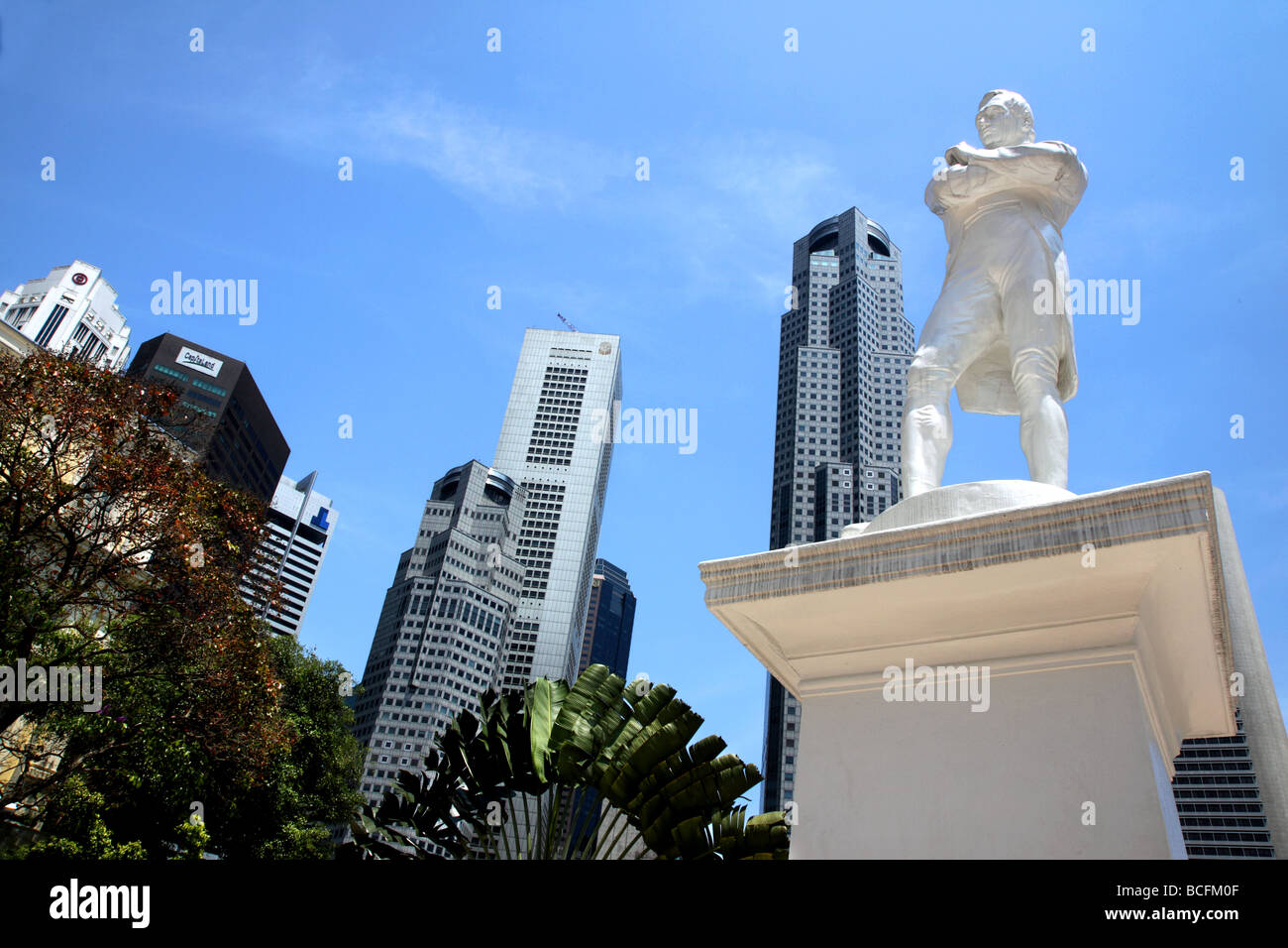 Statue of Raffles and Singapore Skyline Stock Photo