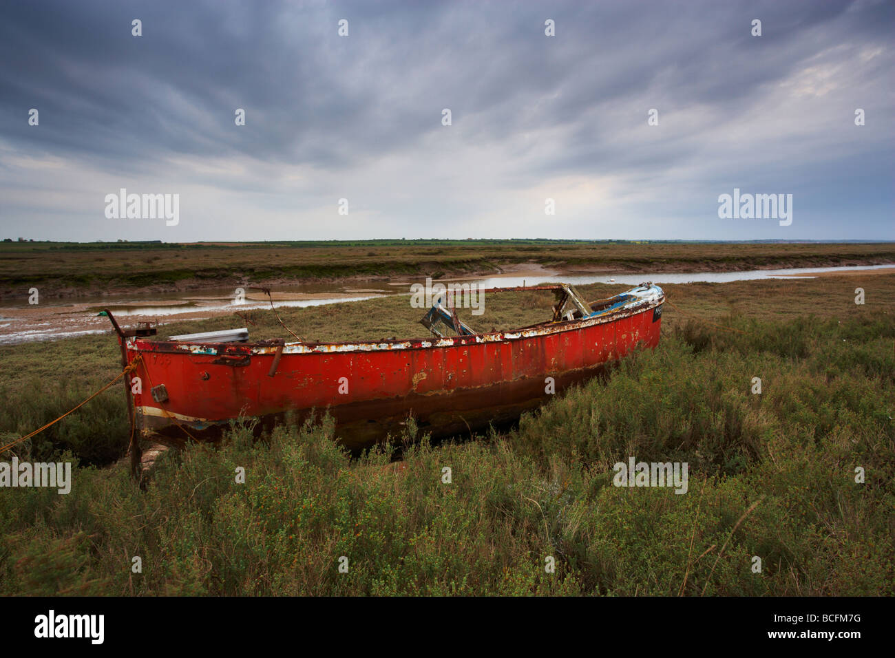 A moody summer evening on the marshes at Stiffkey on the North Norfolk Coast Stock Photo