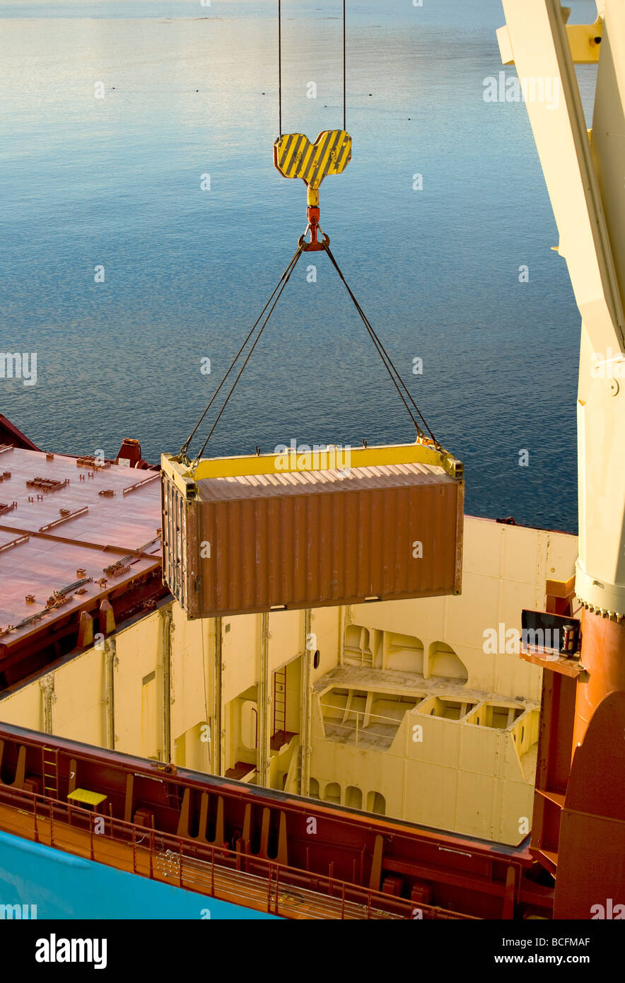loading shipping container onto ship Stock Photo Alamy