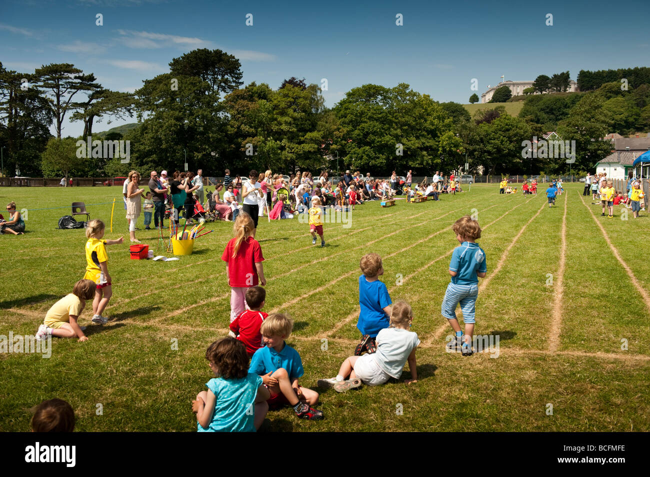 Young children competing in races at a Primary School sports day, Aberystwyth wales UK Stock Photo