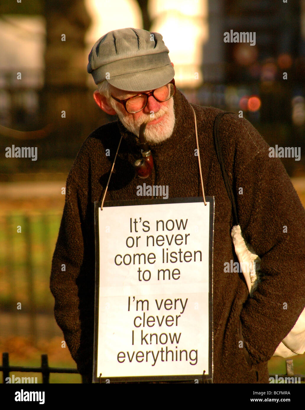English man stand in the park with funny placard hanging on his neck Stock  Photo - Alamy