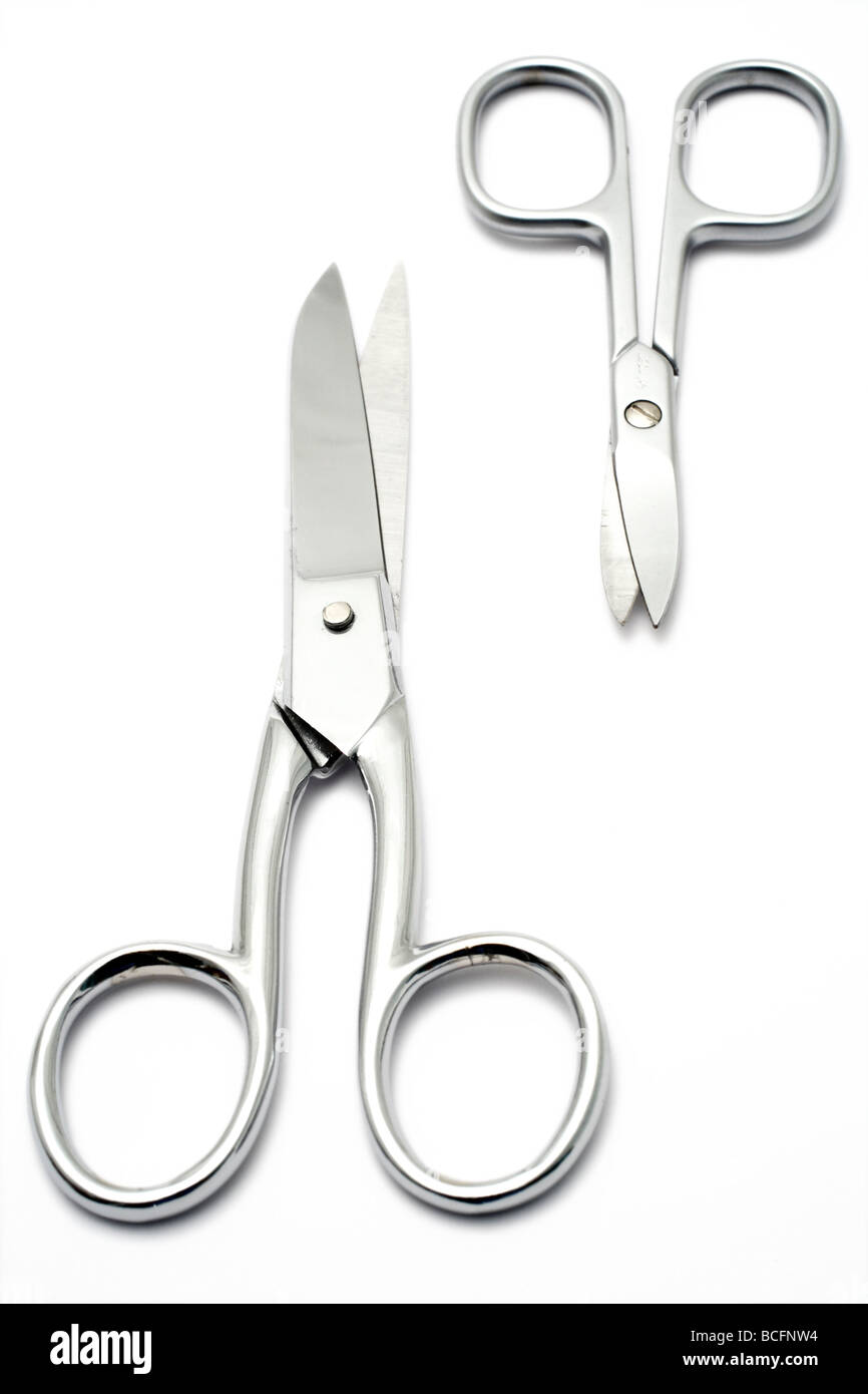 Two scissors Cut Out Stock Images & Pictures - Alamy